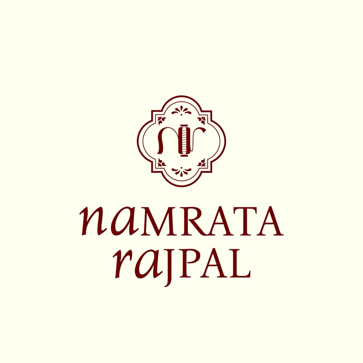 Namrata Rajpal logo concept 3: ornate framed monogram with thread-spool detail