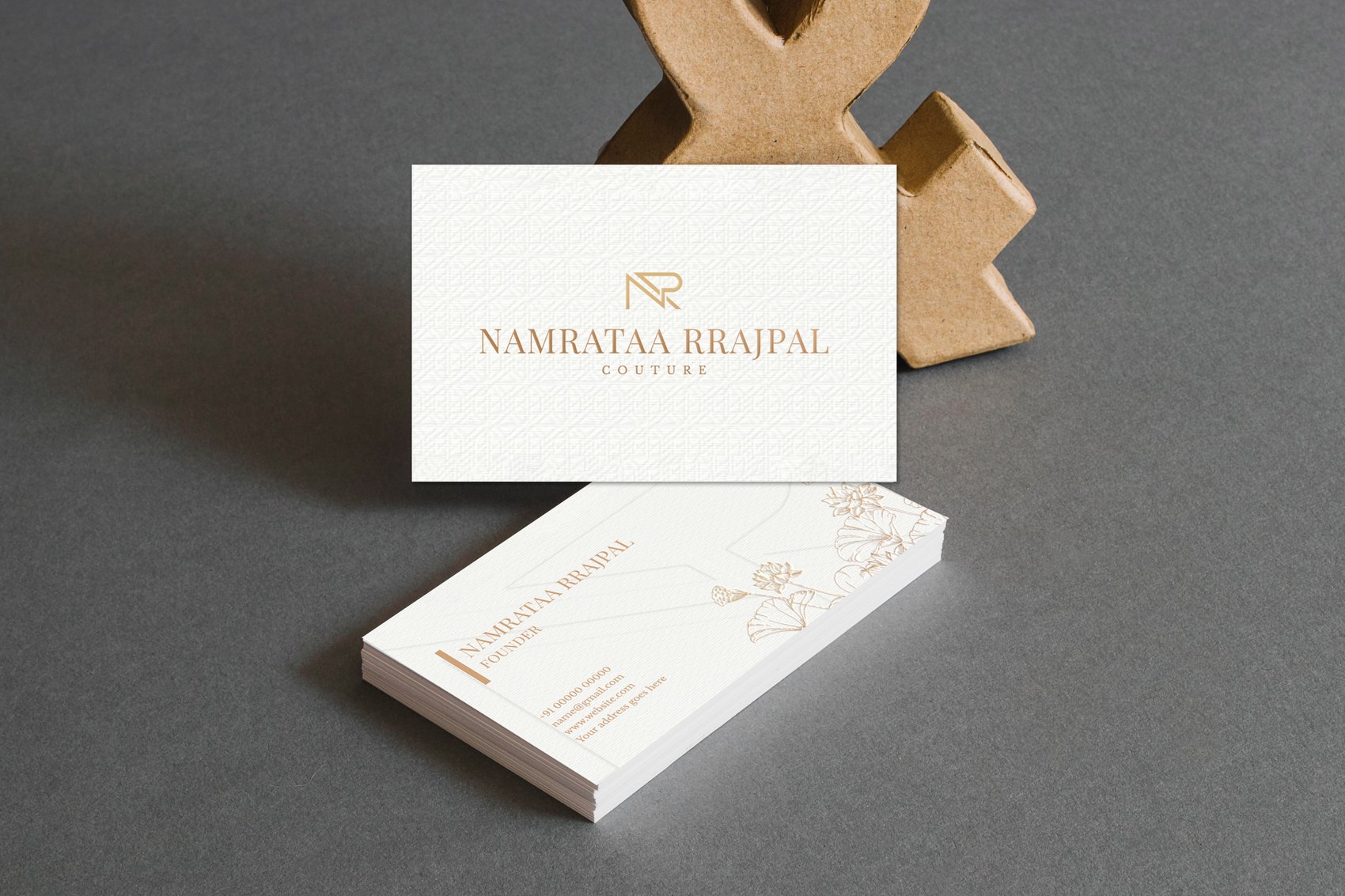 Namrataa Rrajpal Couture visiting cards, front and reverse, with gold foil monogram and lotus line pattern